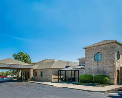 a building with a gazebo in front of it at Comfort Inn Bellefontaine in Bellefontaine