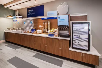 an apple store with a counter with an appleasteryasteryasteryasteryasteryasteryastery at Holiday Inn Express Columbus South - Obetz by IHG in Obetz