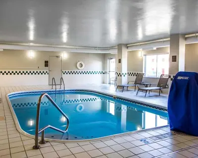 a large swimming pool in a hotel room at Comfort Suites Columbus West - Hilliard in Columbus