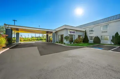 a large parking lot in front of a hotel at Spark By Hilton Cleveland Beachwood in Beachwood