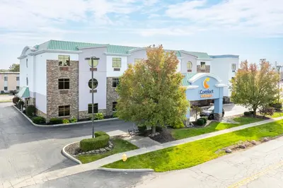 an aerial view of a hotel with a building at Comfort Suites Perrysburg - Toledo South in Perrysburg