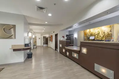 a lobby of a hospital with a reception counter at Comfort Suites Perrysburg - Toledo South in Perrysburg