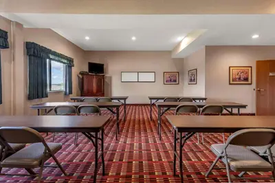 a classroom with tables and chairs in a room at Comfort Inn & Suites Streetsboro - Kent in Streetsboro
