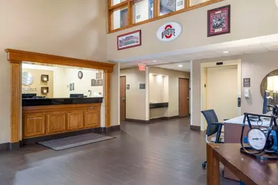 a lobby with a waiting room with a desk and a waiting room at Comfort Inn North-Polaris in Columbus