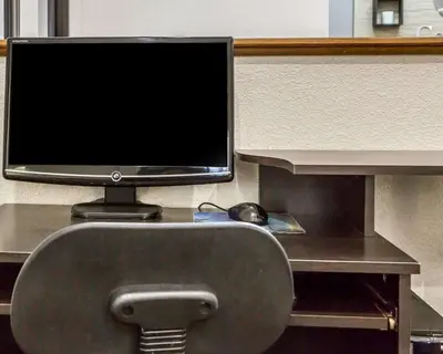 a computer monitor sitting on top of a desk at Quality Inn & Suites Circleville in Circleville