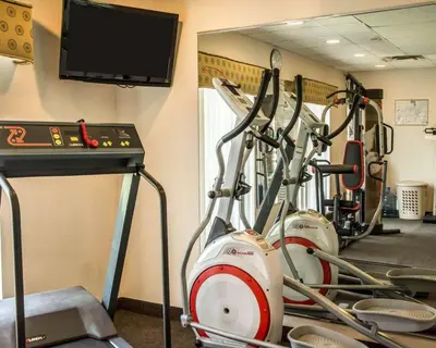 a gym with a row of exercise bikes at Quality Inn Springboro West in Springboro