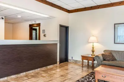 a living room with a large garage door at Quality Inn Gallipolis in Gallipolis