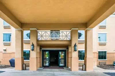 a building with a door in front of it at Comfort Inn Meadowlands in Washington