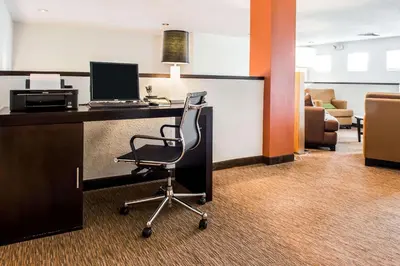 an office with a desk with a computer and a chair at Quality Inn Bridgeport-Clarksburg in Bridgeport