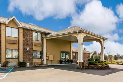 a building with a gazebo in a parking lot at Quality Inn I-74 Batesville in Batesville