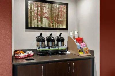 a coffeemaker sitting on top of a counter at Red Roof Inn Cleveland - Westlake in Westlake