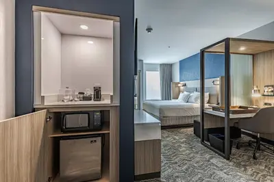 a hotel room with a bed and a desk at SpringHill Suites by Marriott Fort Wayne North in Sunnybrook Acres