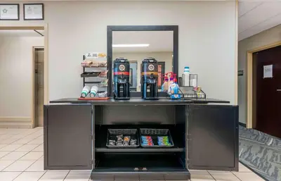 a counter in a room with a mirror at Extended Stay America Suites - Fort Wayne - South in Fort Wayne