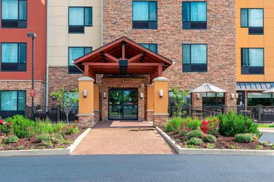 a building with a door in front of it at TownePlace Suites Fort Wayne North in Fort Wayne