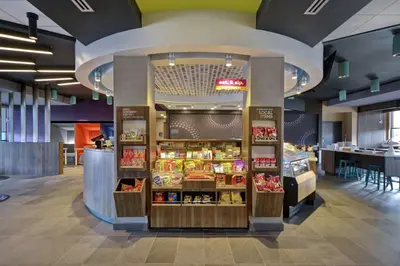 a grocery store with a display of food at Tru By Hilton Mason King's Island in Mason