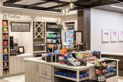 a store with a counter in a grocery store at Hilton Garden Inn Pittsburgh Area Beaver Valley, Pa in Monaca