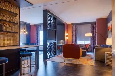 a bar in a hotel room with a lobby at Hilton Garden Inn Pittsburgh Area Beaver Valley, Pa in Monaca
