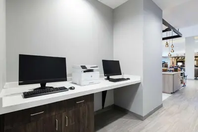 an office with a desk with a computer and a printer at Hilton Garden Inn Pittsburgh Area Beaver Valley, Pa in Monaca