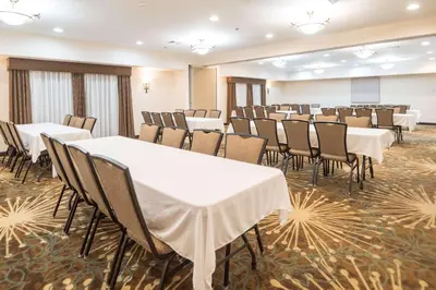 a large room with tables and chairs in a classroom at Hampton Inn Tiffin in Tiffin