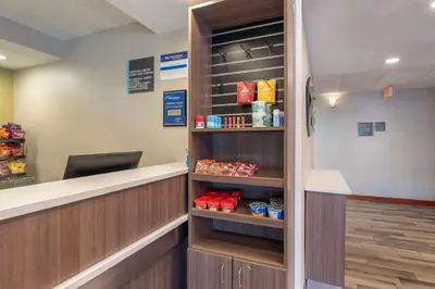 a waiting area of a pharmacy with a cash register at Best Western St. Clairsville Inn & Suites in Saint Clairsville