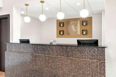 a tile counter in a dental office with pendant lights at Comfort Suites Columbus in Columbus