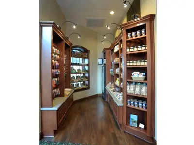 a pharmacy aisle with shelves of products in a store at Carlisle Inn in Sugarcreek