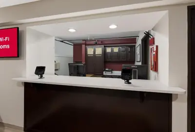 a kitchen with a white counter top in a room at Red Roof Inn Mansfield in Mansfield