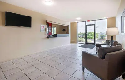 a living room with a couch and a tv at Extended Stay America Suites - Dayton - Fairborn in Dayton