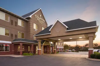 a rendering of a hotel building with a parking lot at Country Inn & Suites by Radisson, Lima in Lima