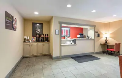 a waiting room with a counter and a kitchen at Extended Stay America Suites - Cleveland - Westlake in Westlake