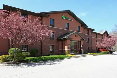 a large red brick building with a sign on it at Extended Stay America Suites - Cleveland - Westlake in Westlake
