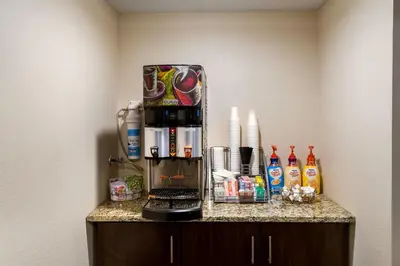 a coffee maker on a counter in a room at Red Roof Inn Richmond, IN in Richmond