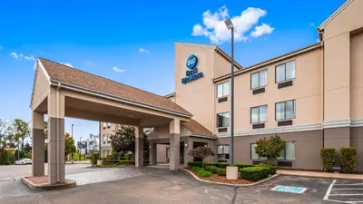 a rendering of a hotel with a parking lot at Best Western B R Guest in Zanesville