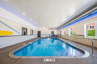 a large swimming pool in a large room with at Comfort Suites Marysville Columbus - Northwest in Marysville