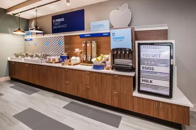 an apple store with a counter with an appleasteryasteryasteryasteryasteryasteryastery at Holiday Inn Express & Suites North Fremont by IHG in Fremont