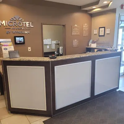 a counter in a store with two white doors at Microtel Inn & Suites by Wyndham Marietta in Marietta