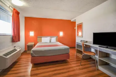 a hotel room with a bed and a television at Motel 6-North Ridgeville, OH - Cleveland Intl Airport - N Ridgeville in North Ridgeville