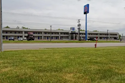 a building with a fire hydrant in front of a road at Motel 6-North Ridgeville, OH - Cleveland Intl Airport - N Ridgeville in North Ridgeville