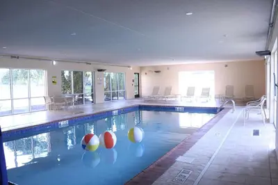 a swimming pool with two balls in the middle of it at Hampton Inn & Suites Fremont in Fremont