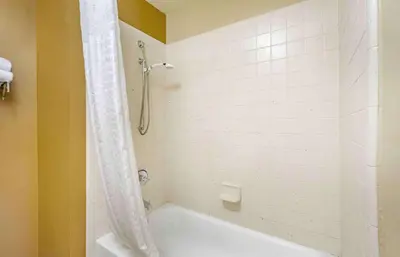 a bathroom with a white tub and a shower at Extended Stay America Suites - Columbus - Tuttle in Dublin