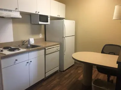 a small kitchen with a sink and a refrigerator at Extended Stay America Suites - Columbus - Tuttle in Dublin