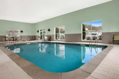 a large swimming pool in a hotel room at Hampton Inn Athens in Athens