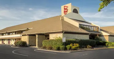 a church building with a clock on the side of it at Red Roof Inn Columbus Northeast Westerville in Westerville