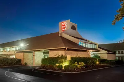 a building with a sign on the front of it at Red Roof Inn Columbus Northeast Westerville in Westerville