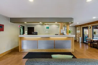 a lobby of a dental office with a waiting room at Quality Inn Athens in Athens