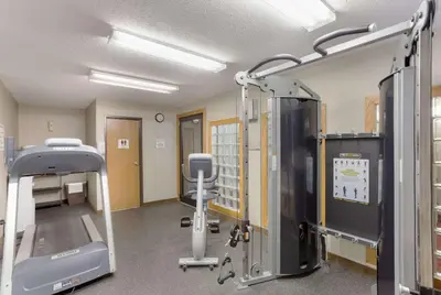 a hospital room with a hospital bed and equipment at Quality Inn Athens in Athens