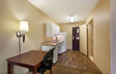 a small room with a desk and a sink at Extended Stay America Suites - Cleveland - Brooklyn in Brooklyn
