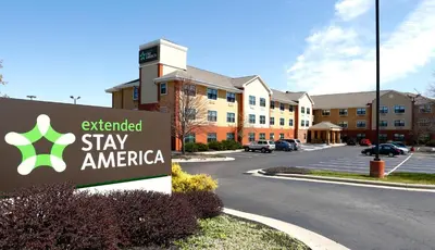 an exterior view of astay america sign in a parking lot at Extended Stay America Suites - Dayton - North in Dayton