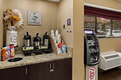 a coffee machine next to a counter in a kitchen at Red Roof Inn Cleveland - Independence in Independence
