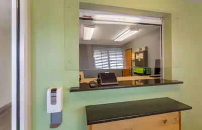 an office with a mirror on the wall at Extended Stay America Select Suites - Cleveland - Avon in Avon